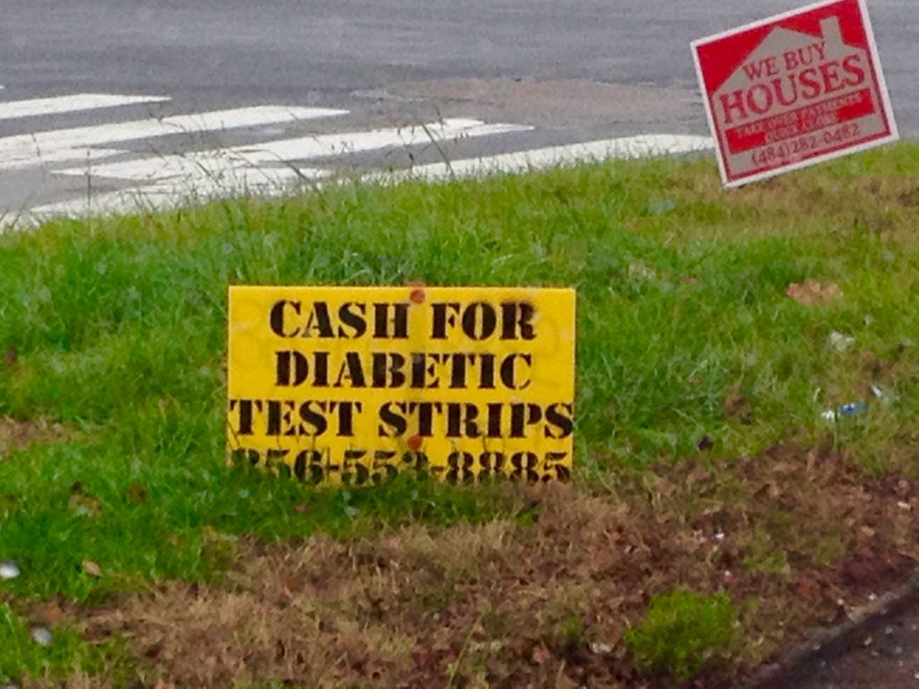 Cash for diabetic test strips” sign at Pennsylvania intersection