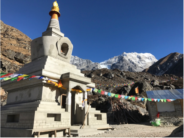Figure 13. The Langtang Memorial Stupa, where water diverted for the micro-hydropower project is now flowing beneath this stupa, turning a large prayer wheel inside (Austin Lord).