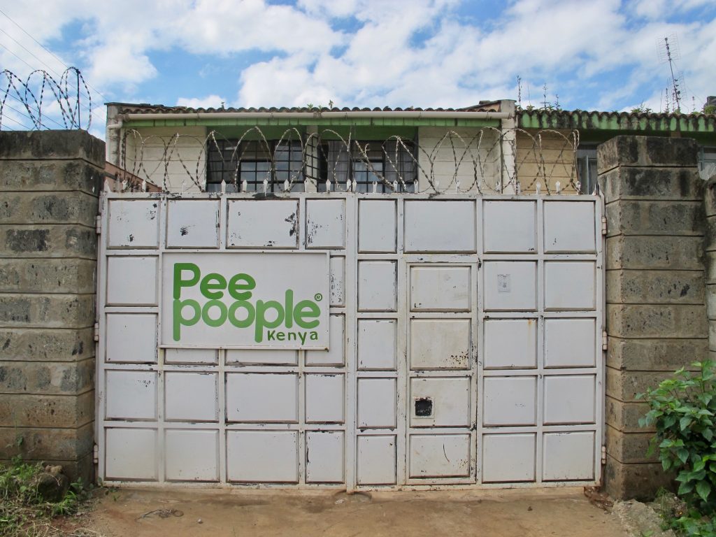 The gate at PeePoople, Kenya. Photo by Peter Redfield.