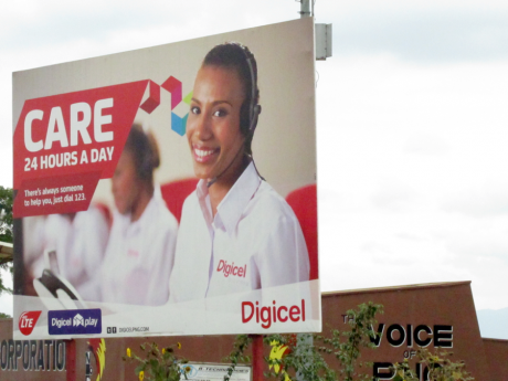 Digicel billboard in Goroka, Eastern Highlands Province, Papua New Guinea, 2015. Photo by M. Boie