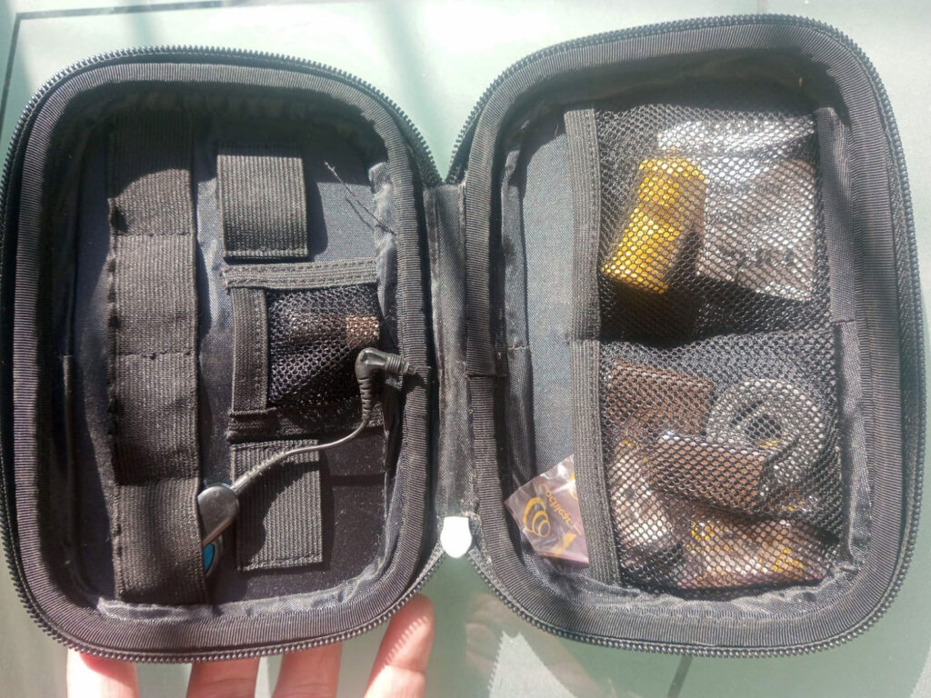 Cochlear implant kit containing spare parts