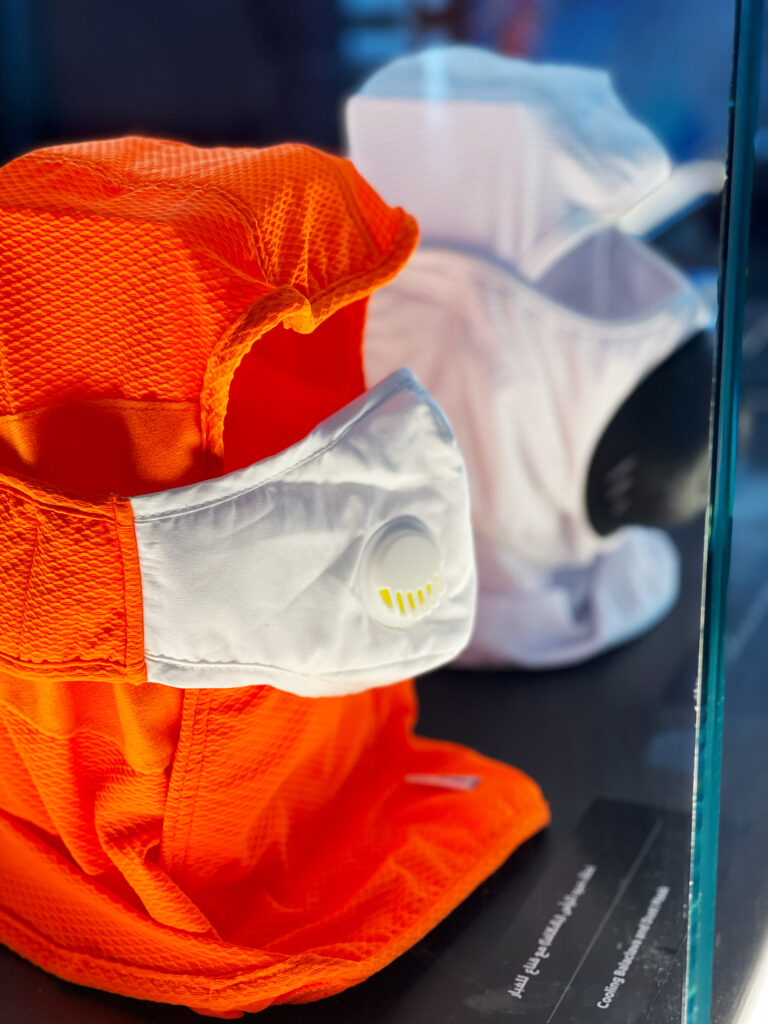 A close-up picture of an orange cooling balaclava